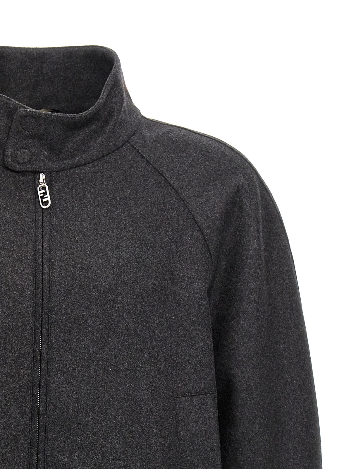 Indulge in the timeless elegance of Fendi's Gray Cashmere Jacket, a masterpiece of Italian craftsmanship that effortlessly elevates your style and sophistication.