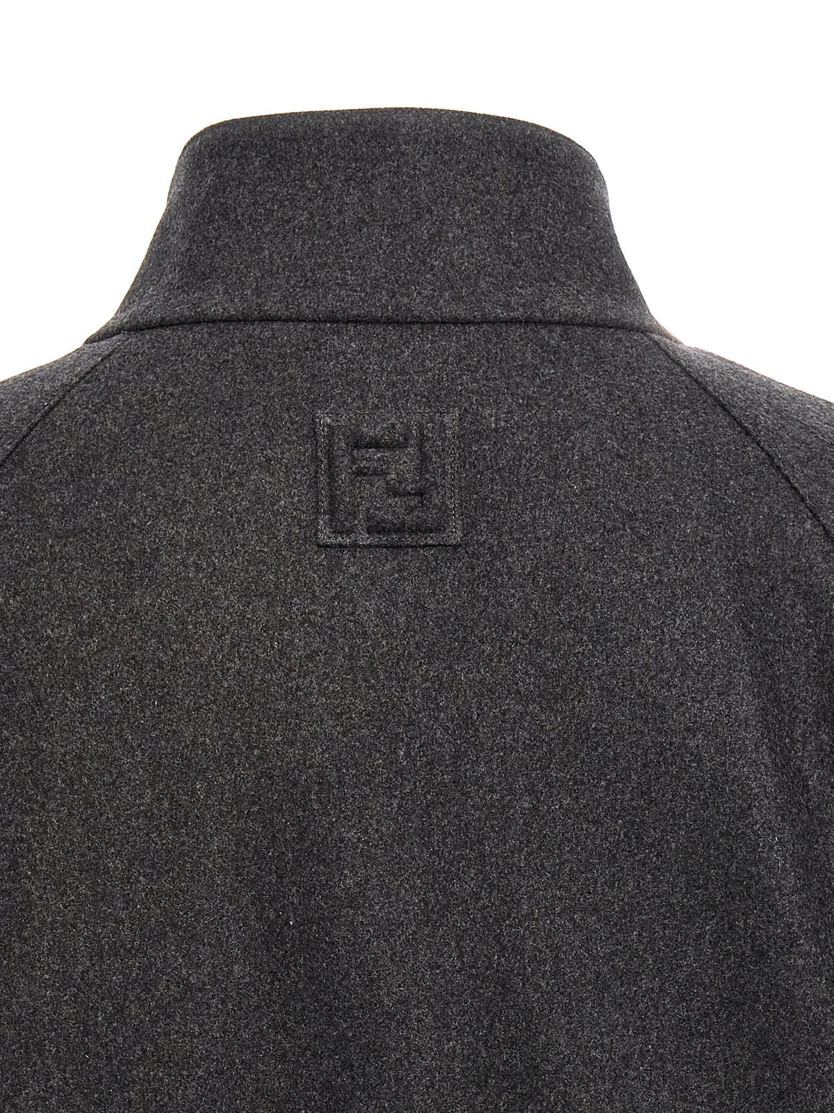 Elevate your wardrobe with FENDI's Gray Cashmere Jacket, a masterpiece of Italian craftsmanship that seamlessly blends sophistication and comfort for the discerning individual.