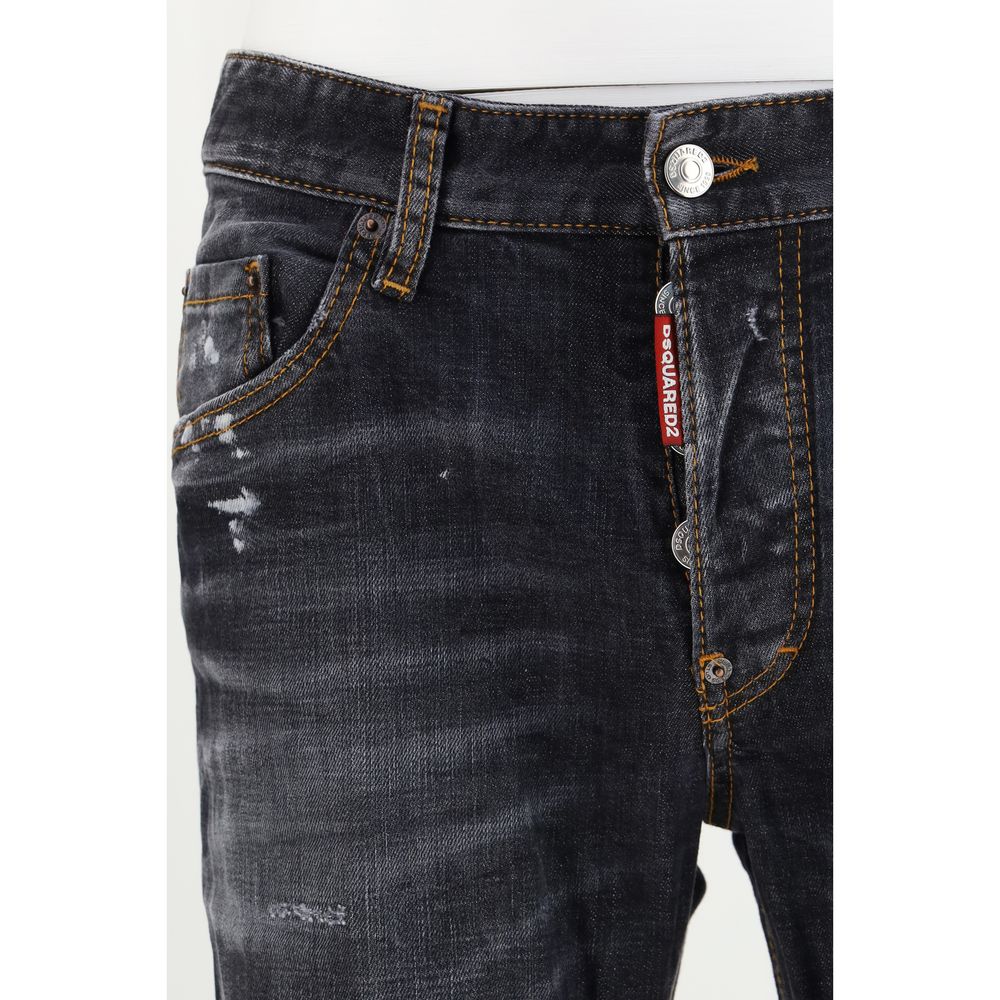 Discover the Dsquared² Black Cotton Skinny Jeans, a masterclass in tailored luxury with distressed details, perfect for the discerning individual seeking timeless style.
