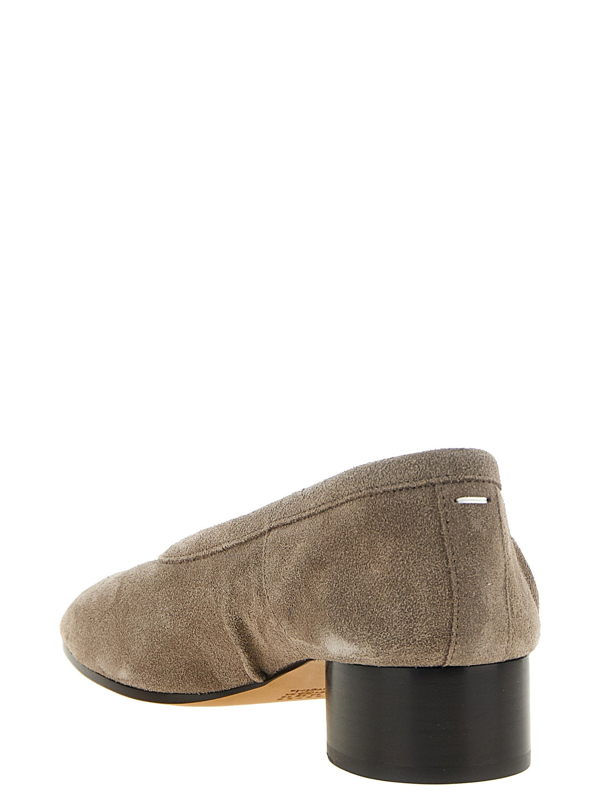 Experience the allure of Maison Margiela's Gray Calfskin Mid Heel Pumps, where avant-garde elegance meets exquisite craftsmanship, perfect for the modern connoisseur.
