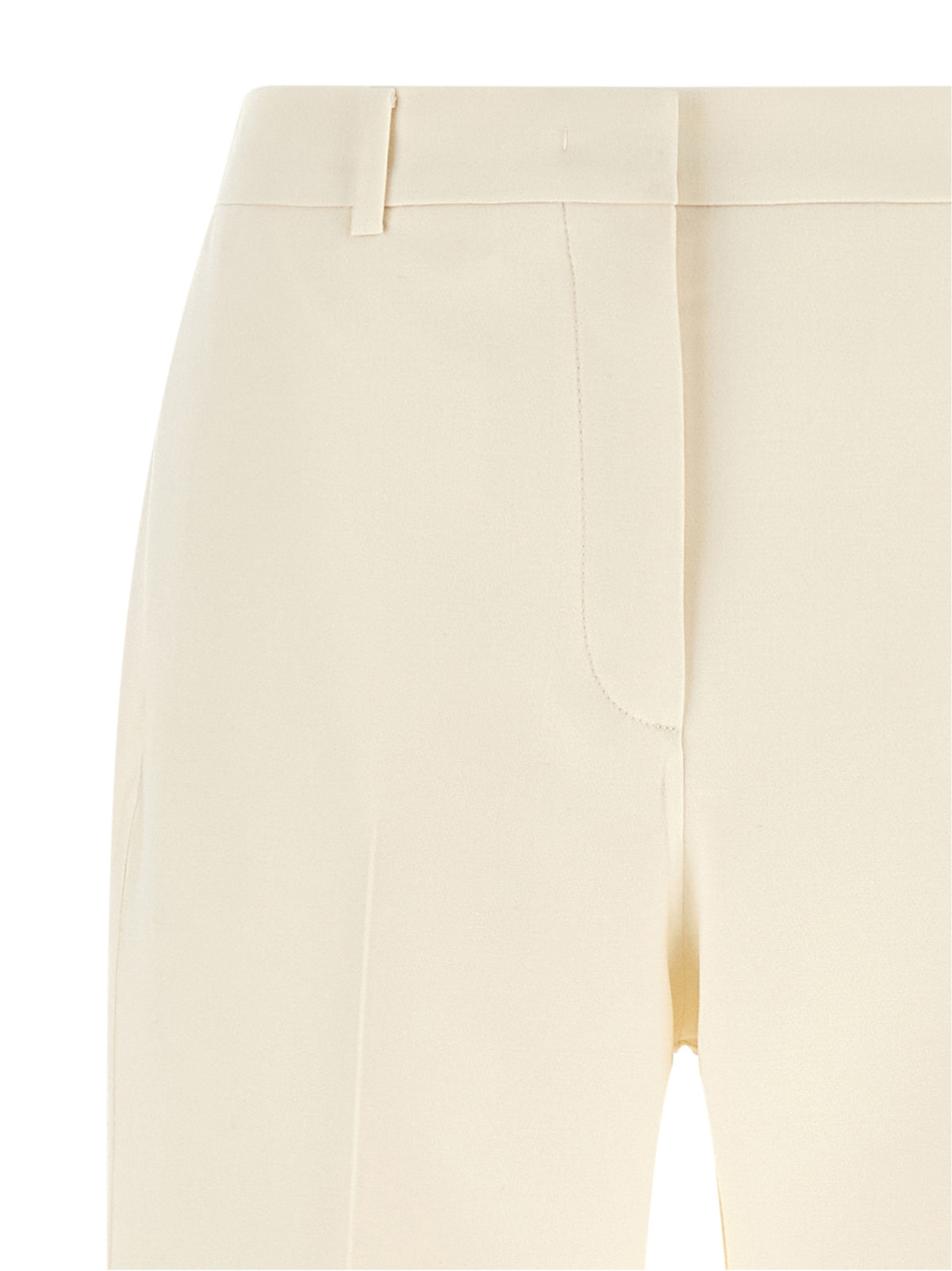 Elevate your wardrobe with Fendi's White Virgin Wool Dress Pants, a masterpiece of Italian craftsmanship that embodies sophistication and timeless elegance for the discerning trendsetter.