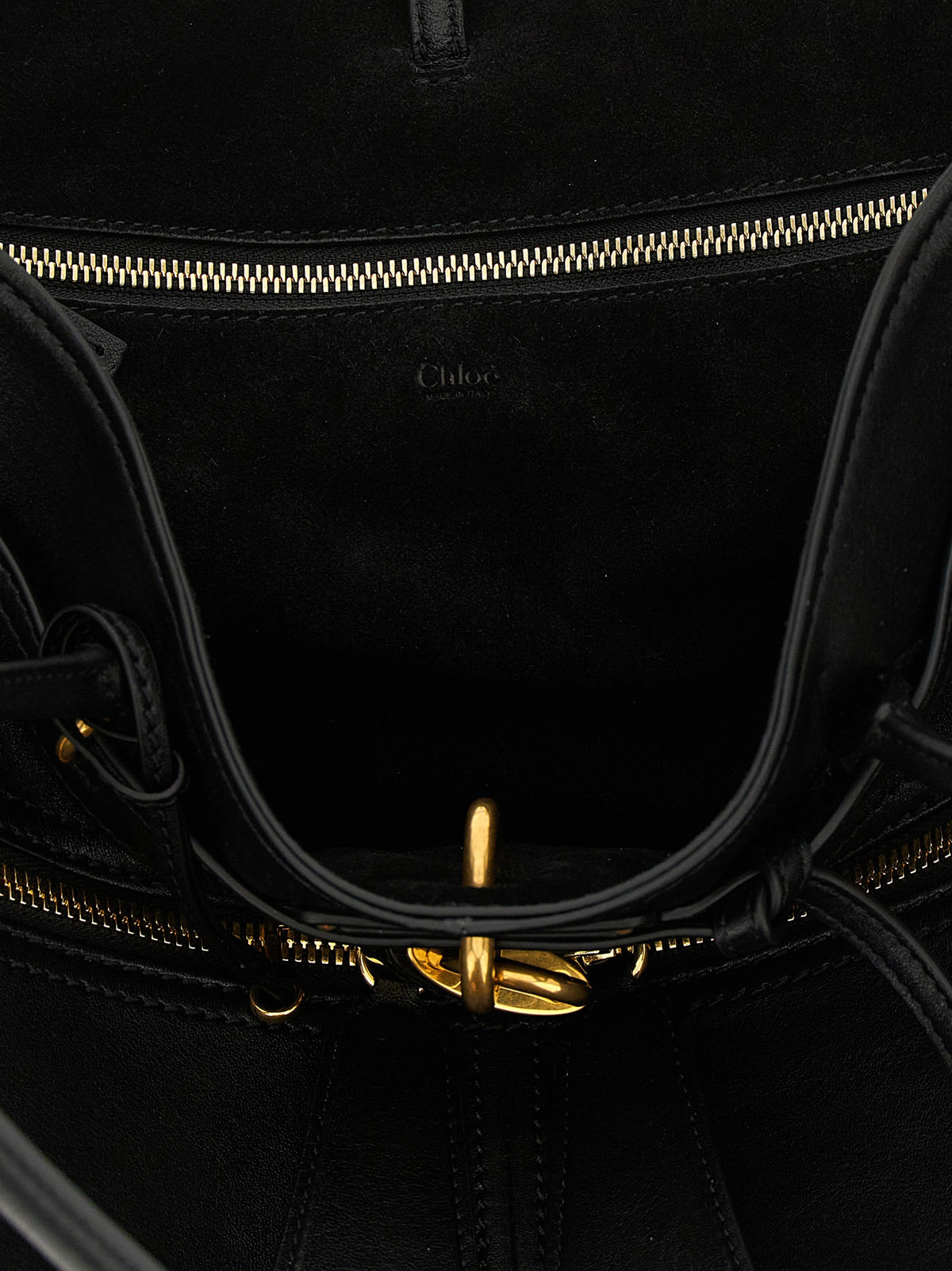 Experience the allure of the Chloé Paddington Sling, a luxurious black lamb leather shoulder bag that redefines sophistication with its exquisite craftsmanship and iconic design.