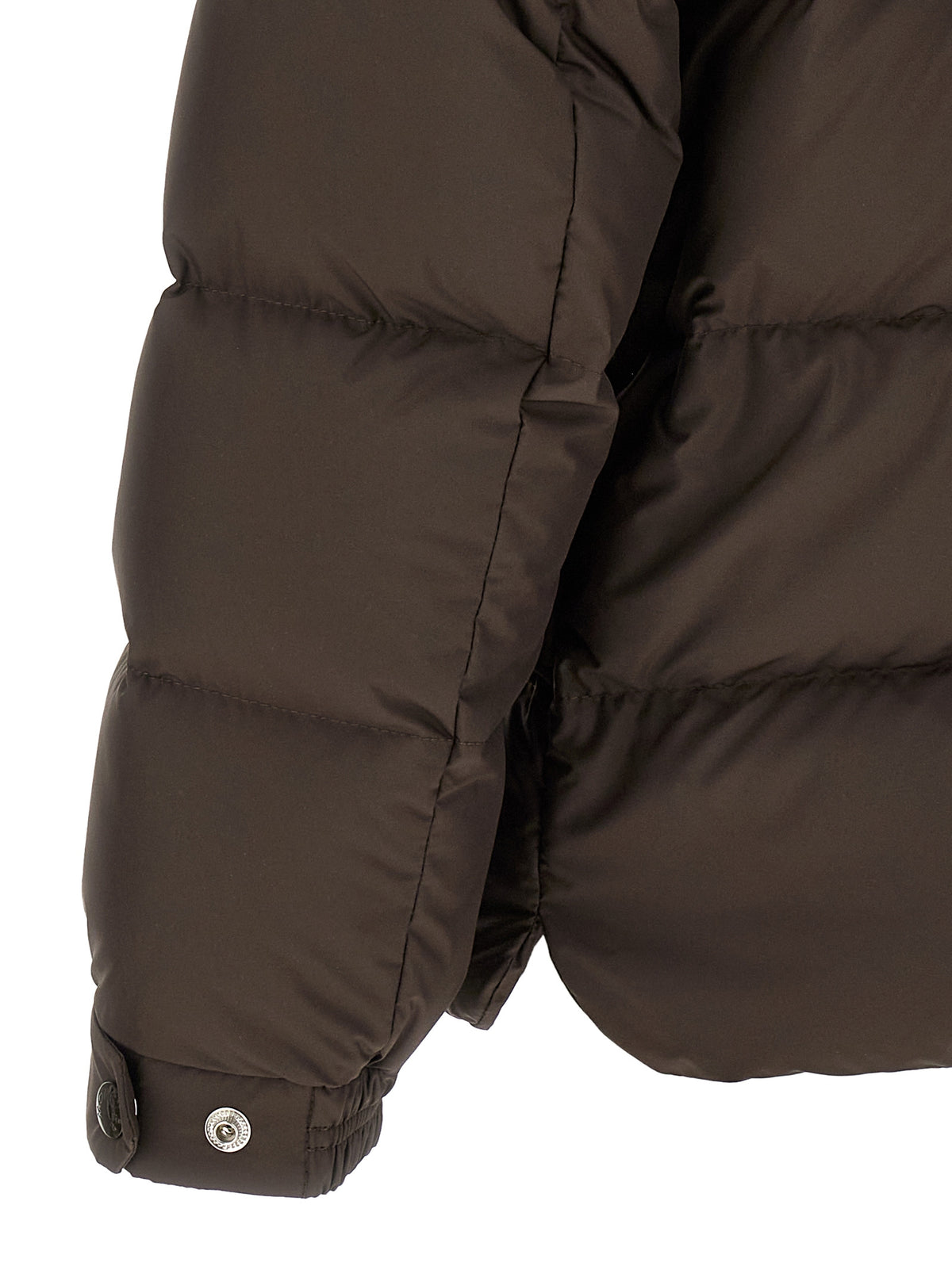 Experience the epitome of sophistication with the Moncler Brown Full-Length Down Jacket, a luxurious blend of style and functionality crafted for the discerning individual.