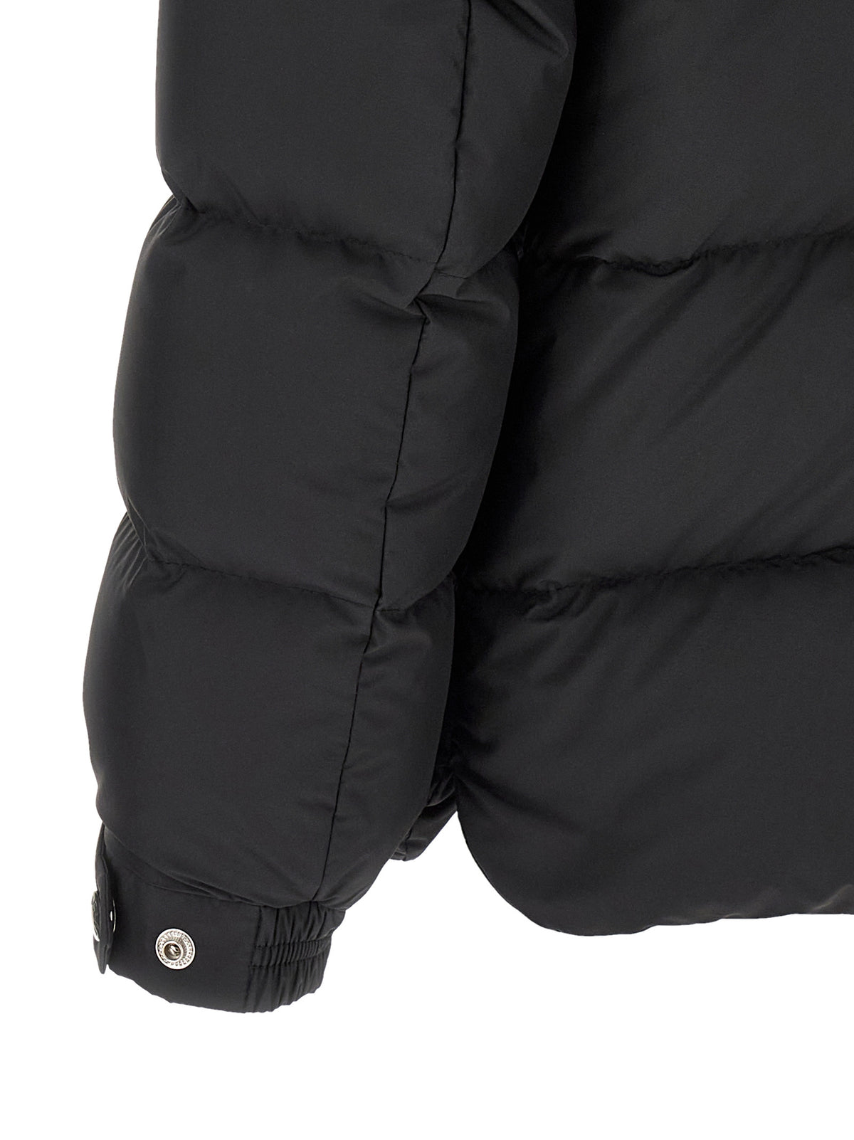 Discover the Moncler Black Polyester Full-Length Jacket, a blend of timeless elegance and sophisticated craftsmanship, perfect for those who embody luxury and style.