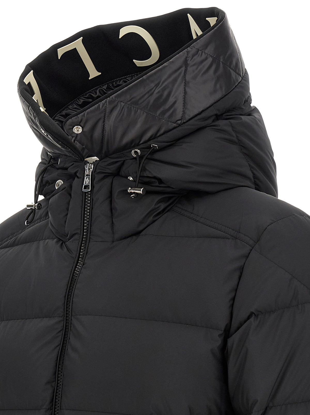 Experience the exquisite Moncler Black Polyester Full-Length Jacket, where timeless elegance meets sophisticated craftsmanship, perfect for discerning tastes.