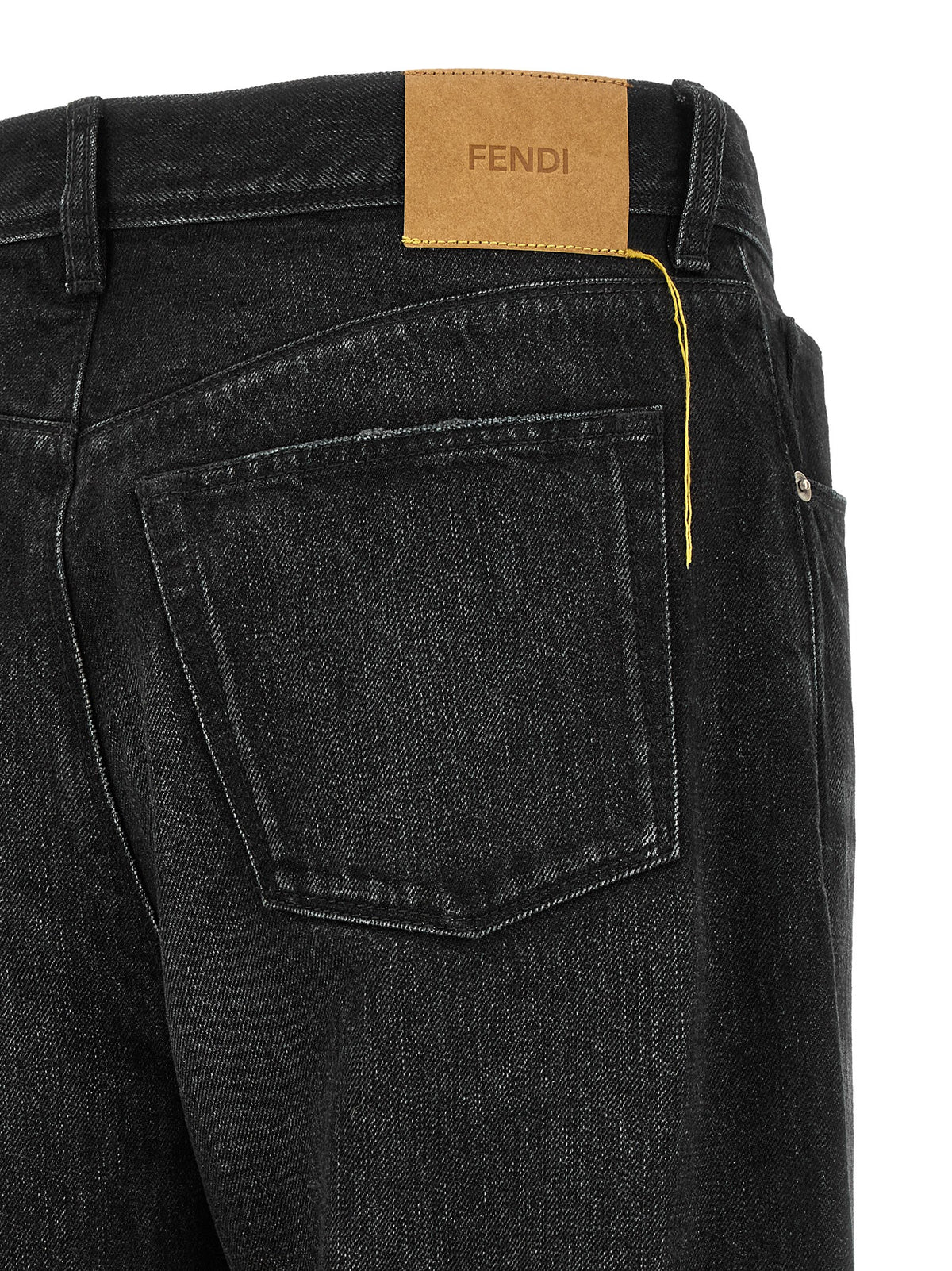 Indulge in the sophistication of Fendi Black Cotton Straight-Leg Jeans, crafted from organic cotton with a timeless design that embodies luxury and effortless elegance.
