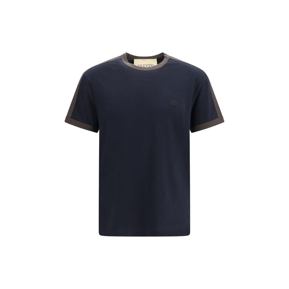 Indulge in the elegance of the Valentino Garavani Blue Cotton T-Shirt, crafted from 100% cotton for a luxurious feel, embodying timeless sophistication and effortless style.