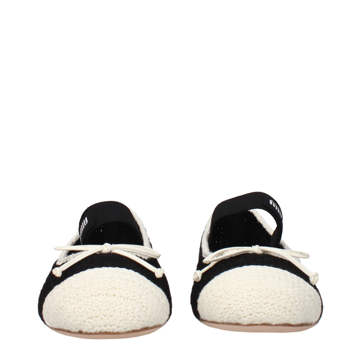 Step into the realm of sophistication with Miu Miu Black Fabric Ballet Flats, where exquisite craftsmanship meets timeless elegance, elevating your every moment.