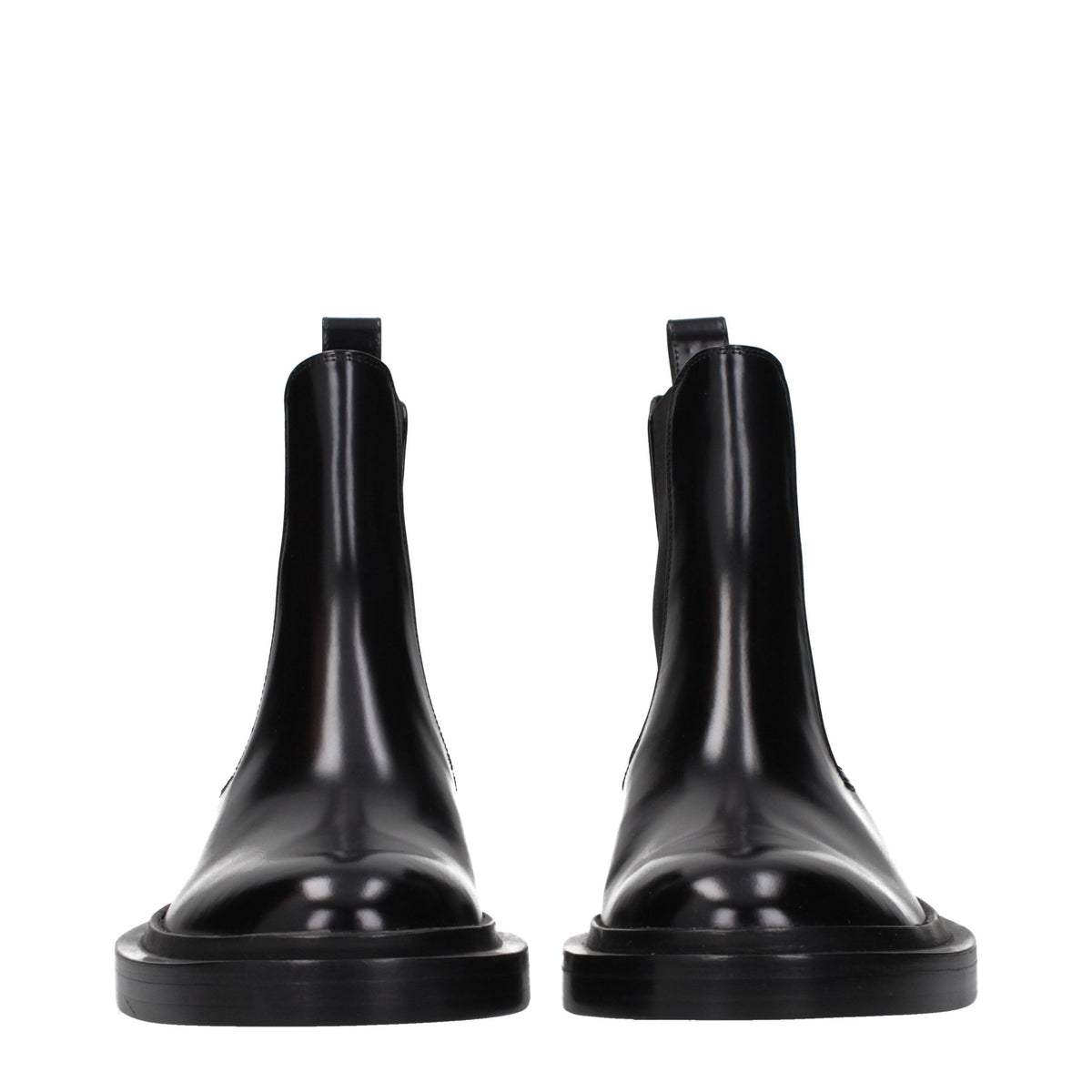 Step into timeless elegance with Jil Sander's Black Leather Ankle Boots, where exquisite craftsmanship meets vintage allure for the discerning connoisseur.