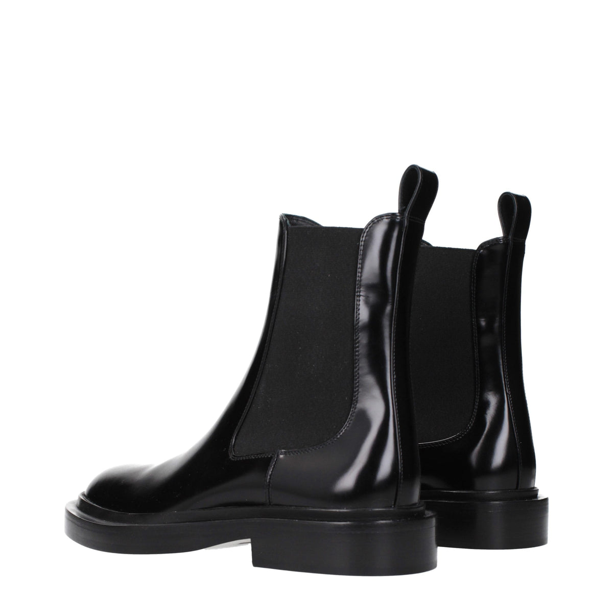 Elevate your wardrobe with Jil Sander's Black Leather Ankle Boots, where exquisite craftsmanship meets timeless elegance, perfect for the discerning connoisseur.