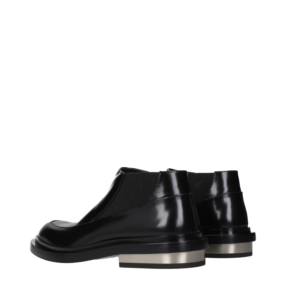 Elevate your style with Jil Sander Black Leather Ankle Boots, where exquisite craftsmanship meets timeless elegance, perfect for the discerning individual seeking sophistication.