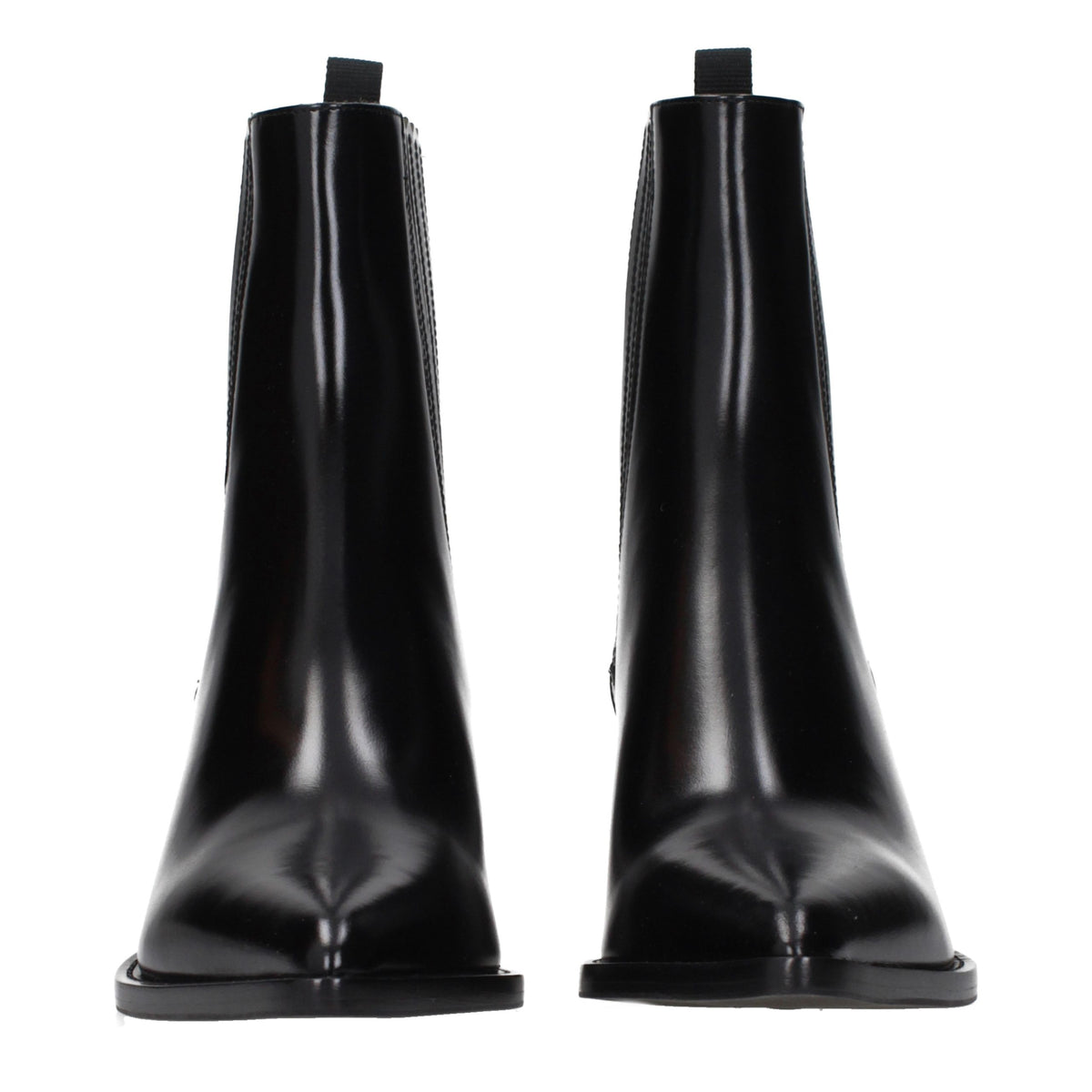 Step into the realm of elegance with Christian Dior's Black Leather Ankle Boots, where exquisite craftsmanship meets timeless sophistication for the discerning fashion connoisseur.