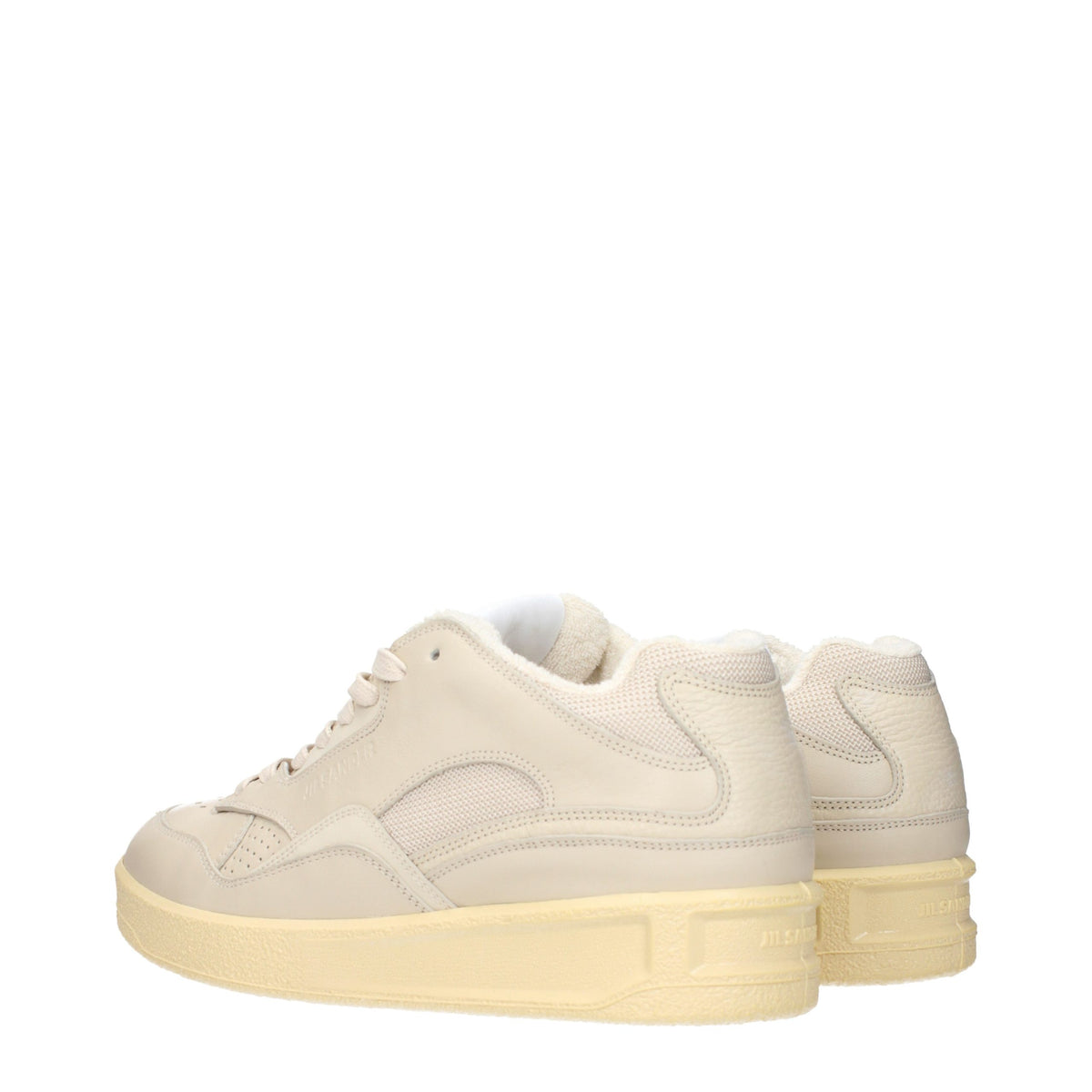 Discover the Jil Sander Beige Leather Low Top Sneakers, where exquisite craftsmanship meets timeless elegance, perfect for the discerning individual seeking refined style.