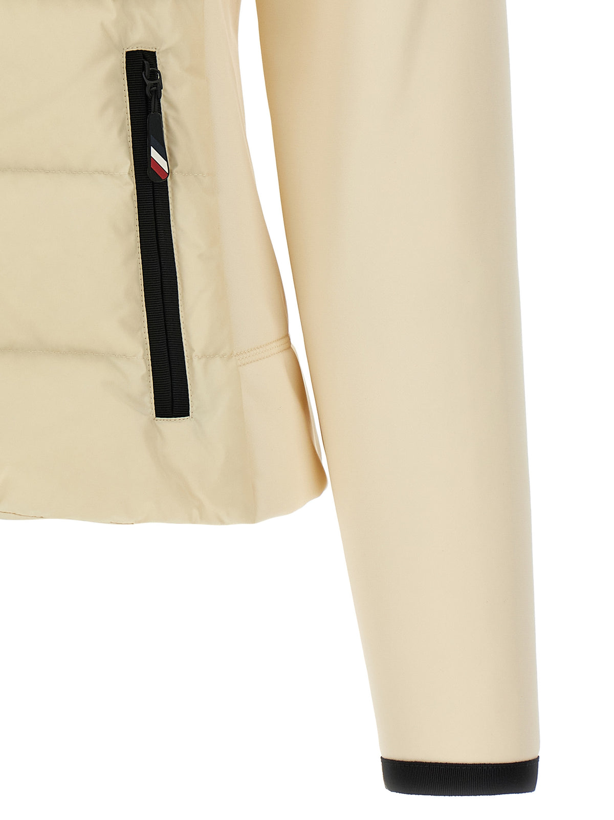 Elevate your style with the Moncler Grenoble Padded Zip-Up Cardigan, a masterpiece of luxurious craftsmanship in soft ivory, perfect for the discerning wardrobe.