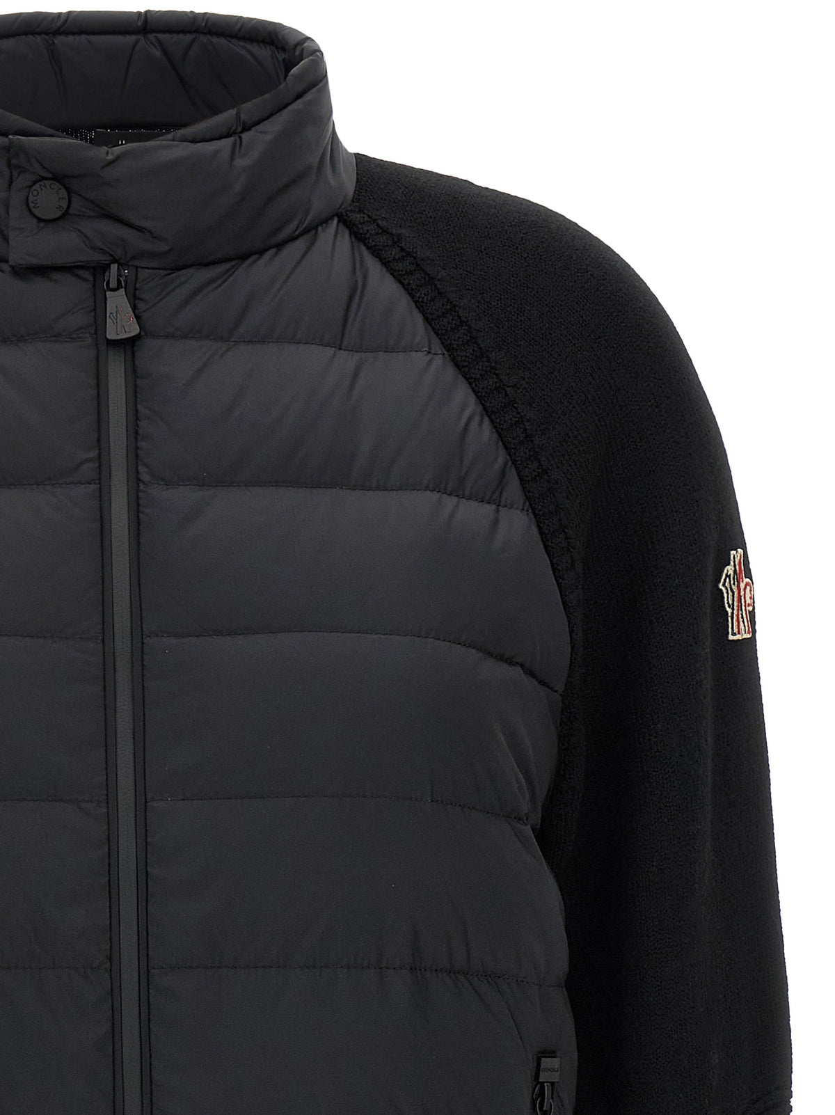 Discover the Moncler Grenoble Black Polyamide Cardigan, where exquisite craftsmanship meets luxurious warmth, perfect for those who embody elegance and sophistication.