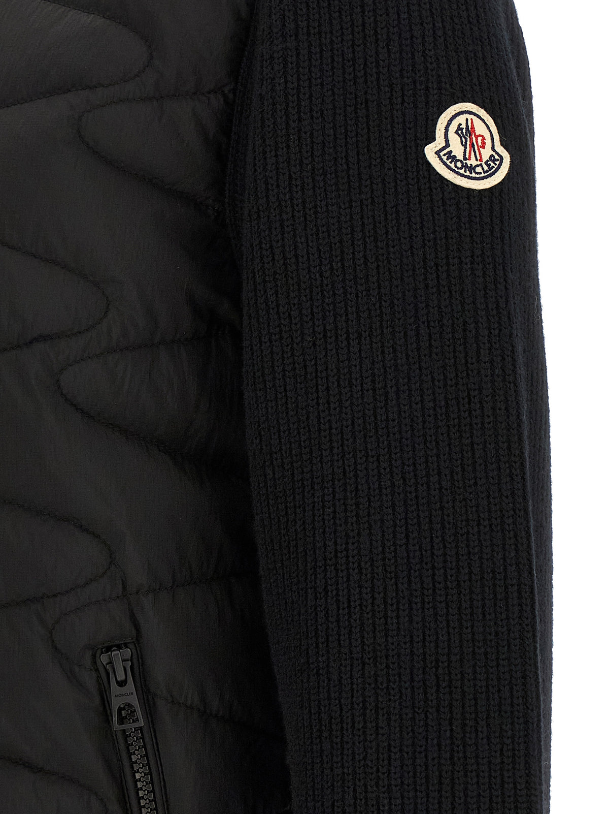 Discover the Moncler Black Polyamide Cardigan, a masterful blend of sophisticated design and luxurious comfort, perfect for those who appreciate exquisite craftsmanship.
