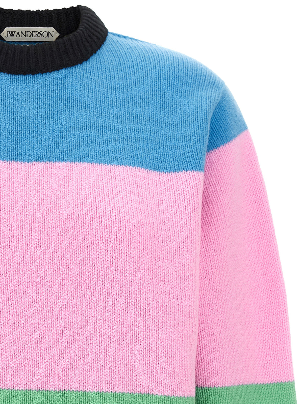 Indulge in the exquisite J.W.Anderson Multicolor Wool Cardigan, a celebration of artistry and luxury, crafted from pure merino wool for timeless elegance.