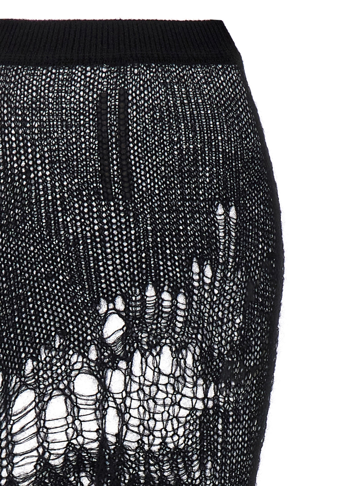 Elevate your wardrobe with the Rick Owens Spider Ziggy skirt, a fusion of perforated mohair and nylon, embodying avant-garde elegance and Italian craftsmanship.