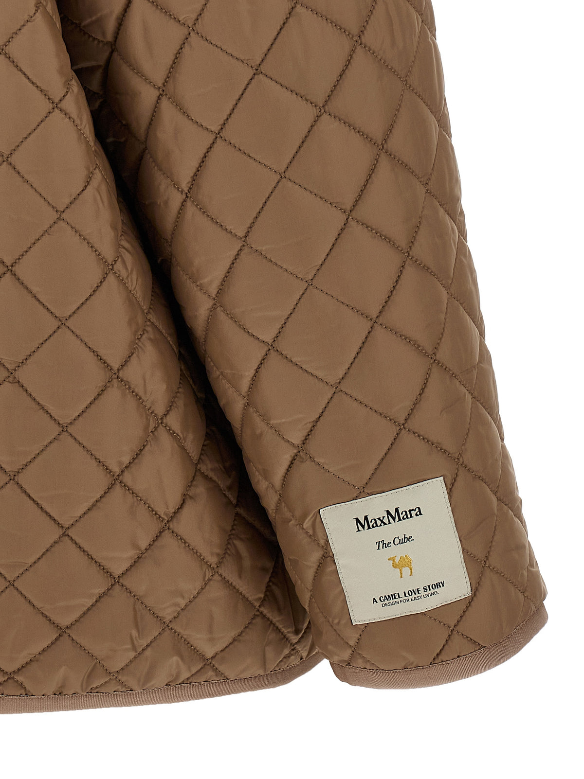 Discover the Max Mara The Cube 'Leo' reversible jacket, a masterpiece of waterproof elegance, blending chic design with luxurious versatility for the discerning individual.