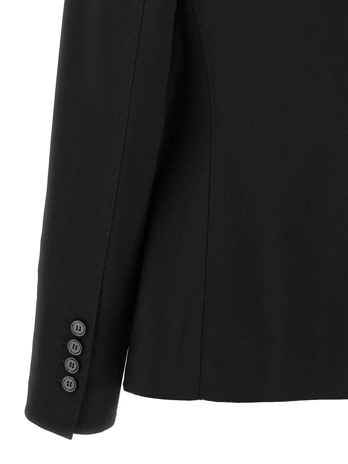Indulge in the allure of the Dolce & Gabbana Black Virgin Wool Blazer, a masterpiece of Italian craftsmanship that embodies minimalistic elegance and refined sophistication.