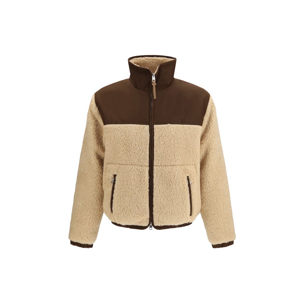 Indulge in the exquisite Ami Paris Beige Polyester Full-Length Jacket, where soft fleece meets luxurious nylon, embodying timeless elegance for the discerning individual.