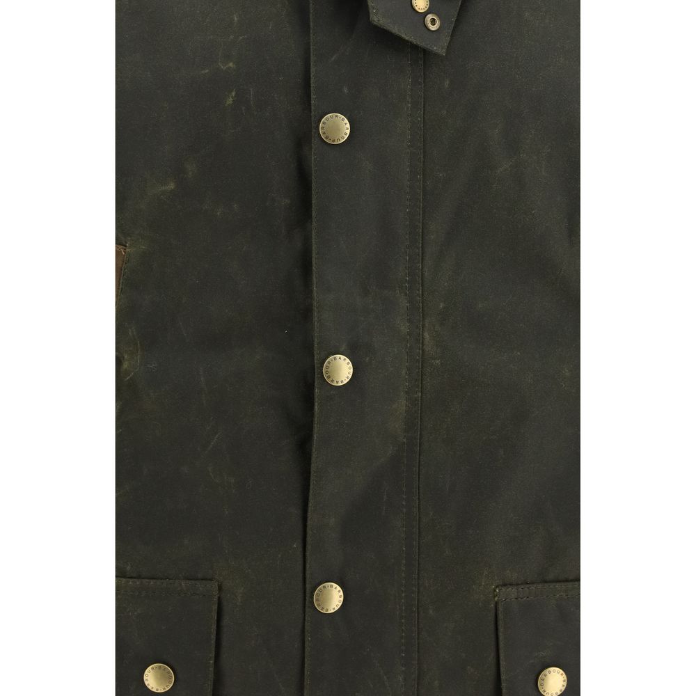 Discover the Barbour Bicolor Cotton Shell Jacket, a masterpiece of waxed cotton craftsmanship, blending timeless elegance with functional design for the discerning individual.