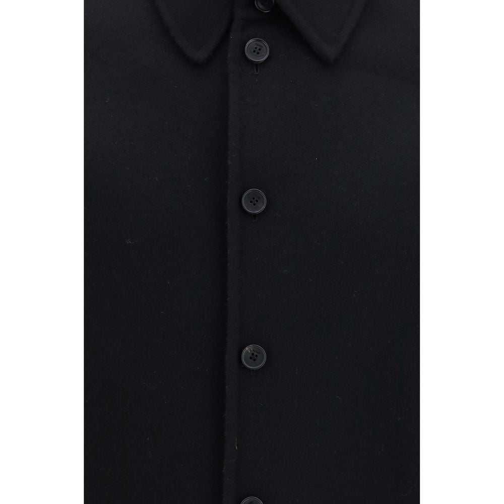 Indulge in the Fendi Black Wool Oves Aries Jacket, a masterpiece of double-faced virgin wool and silk, embodying refined Italian craftsmanship for the discerning connoisseur.