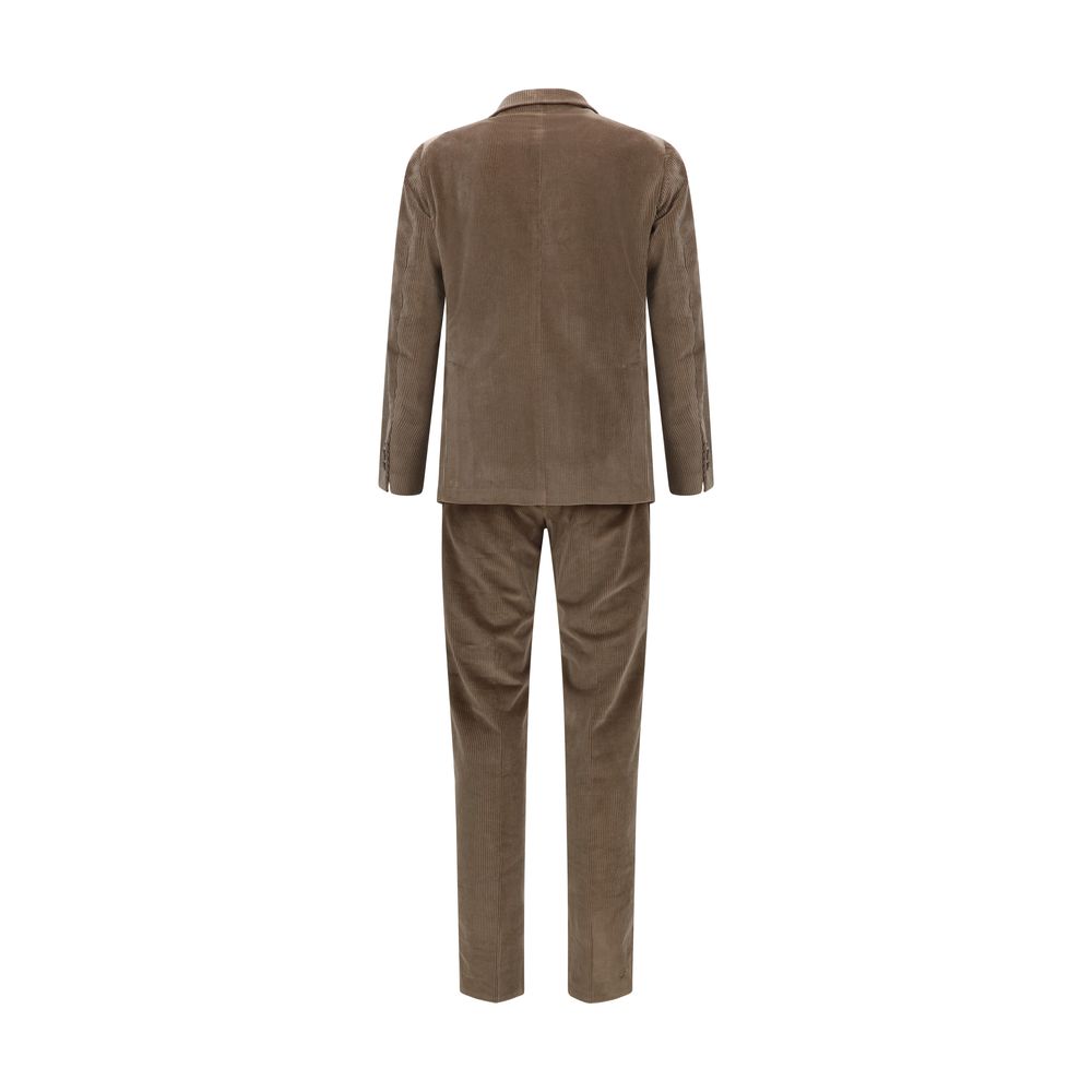 Indulge in the Tagliatore Brown Cotton Two-Piece Suit, a masterful blend of retro elegance and contemporary sophistication, crafted for those who command attention with grace.