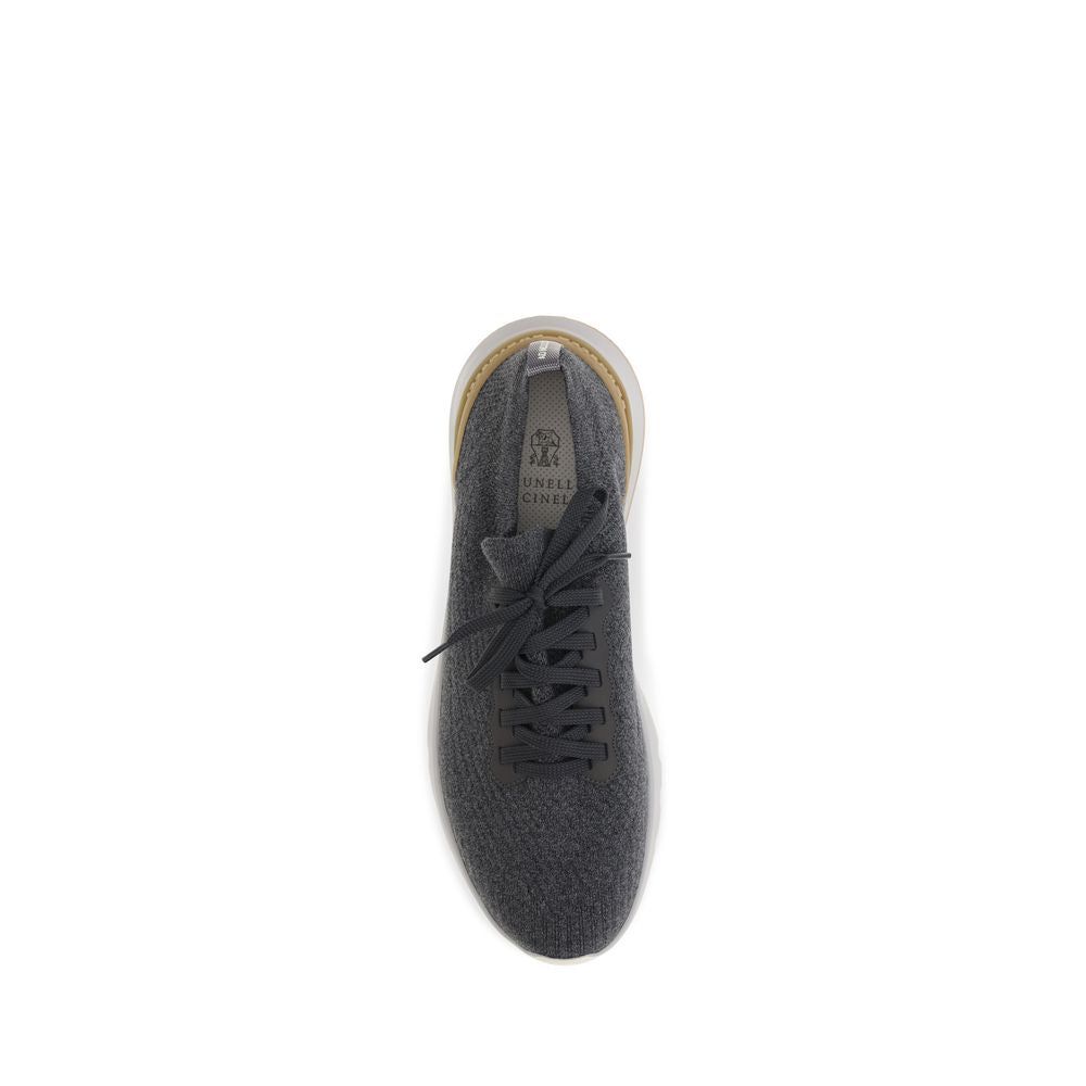 Discover the exquisite Brunello Cucinelli Blue Cotton Low Top Sneakers, a perfect blend of luxury and contemporary design, crafted for those who embody elegance and sophistication.