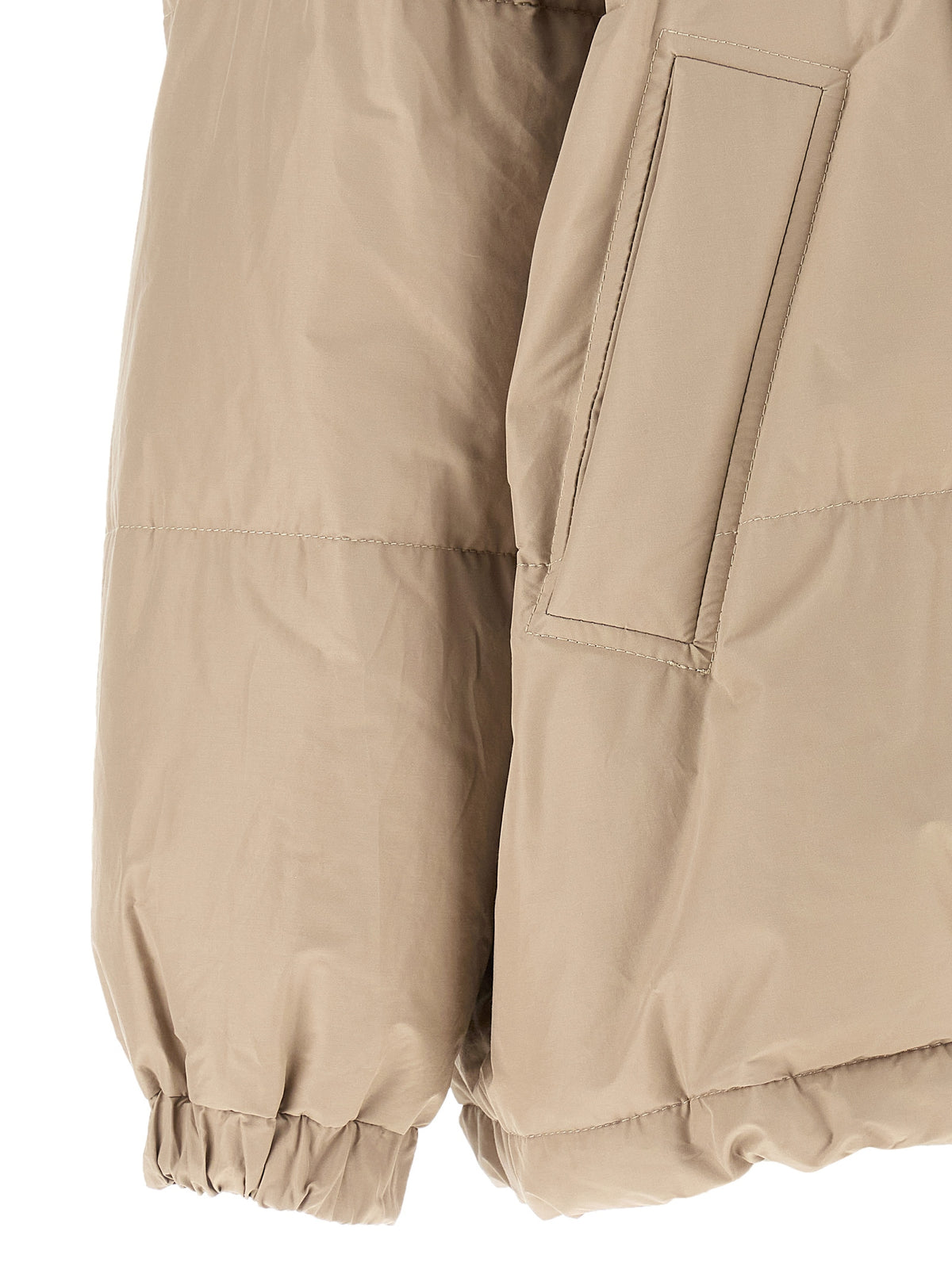 Elevate your outerwear collection with the Brunello Cucinelli Beige Cotton Full-Length Jacket, a masterpiece of luxury craftsmanship, blending elegance and warmth for the discerning individual.