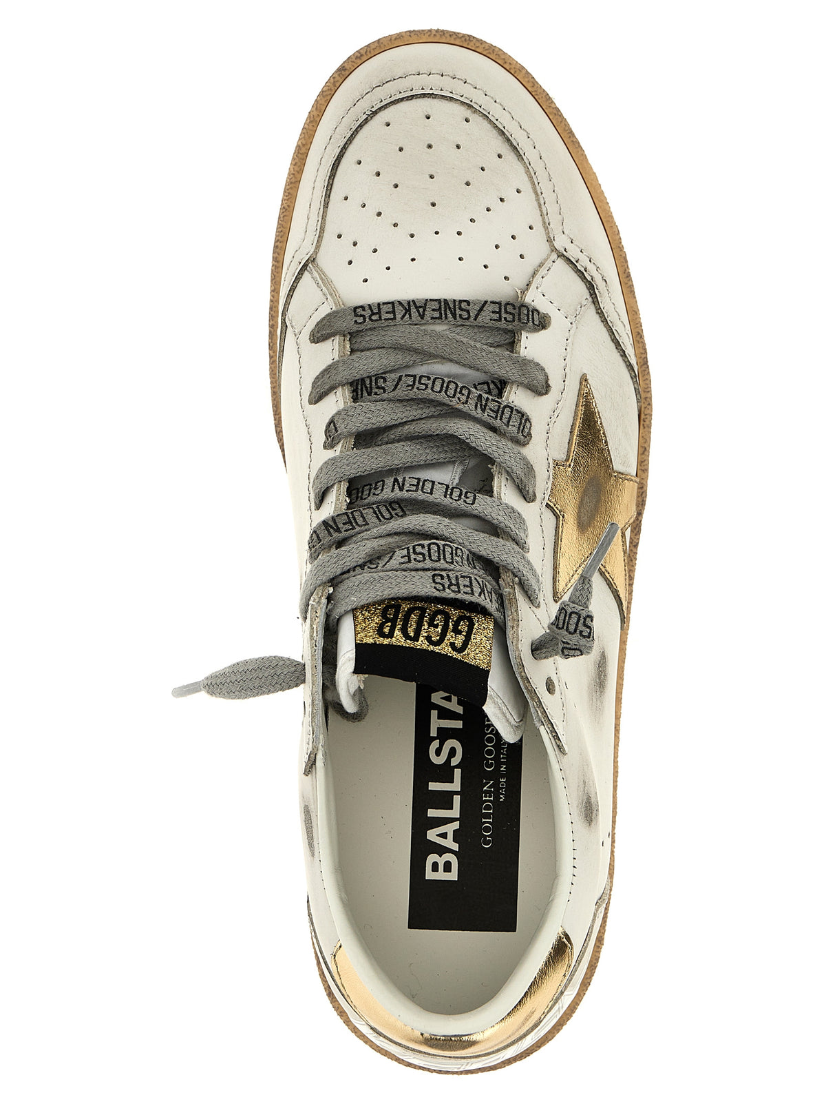 Step into luxury with Golden Goose Gold Cowhide Low Top Sneakers, where Italian craftsmanship meets bold elegance, perfect for the discerning individual.