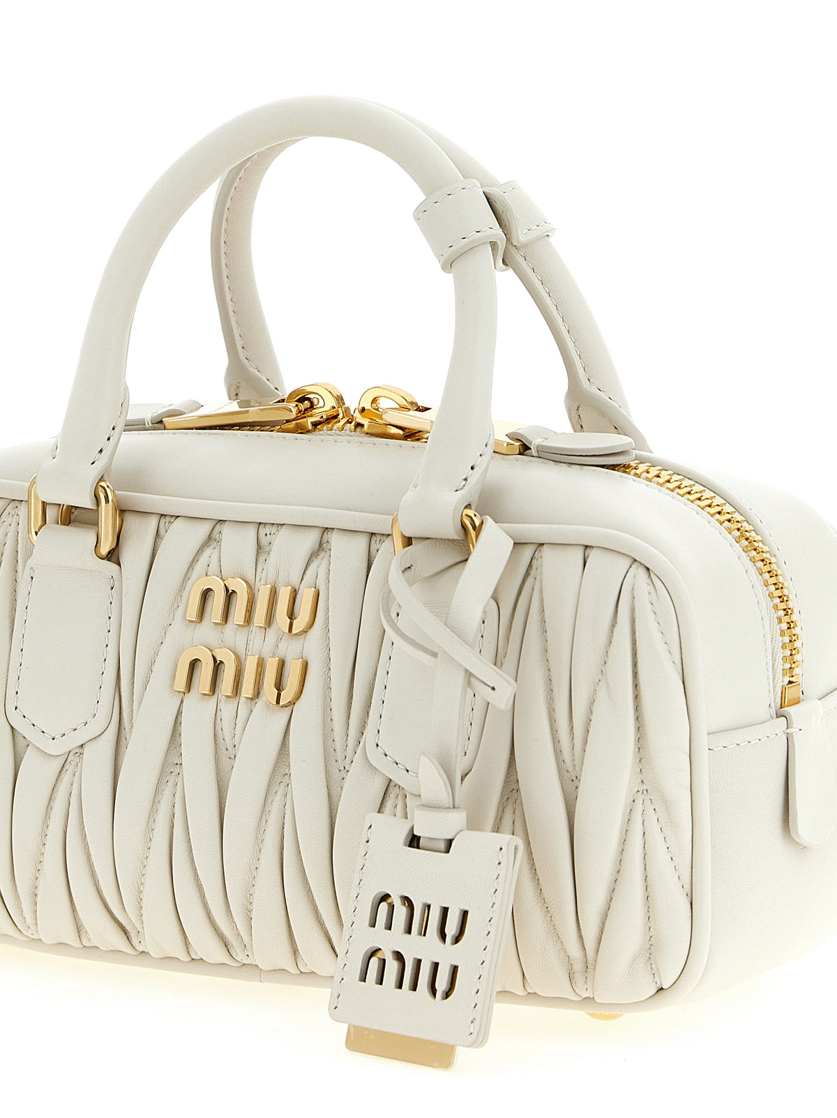 Discover the Miu Miu Arcadie White Leather Handbag, a masterpiece of Italian craftsmanship that embodies timeless elegance and sophistication for the discerning individual.
