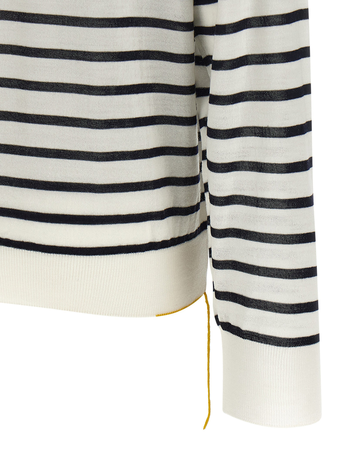 Experience the allure of the Fendi Bicolor Virgin Wool Cardigan, a masterpiece of Italian craftsmanship, blending timeless elegance with modern sophistication for the discerning individual.