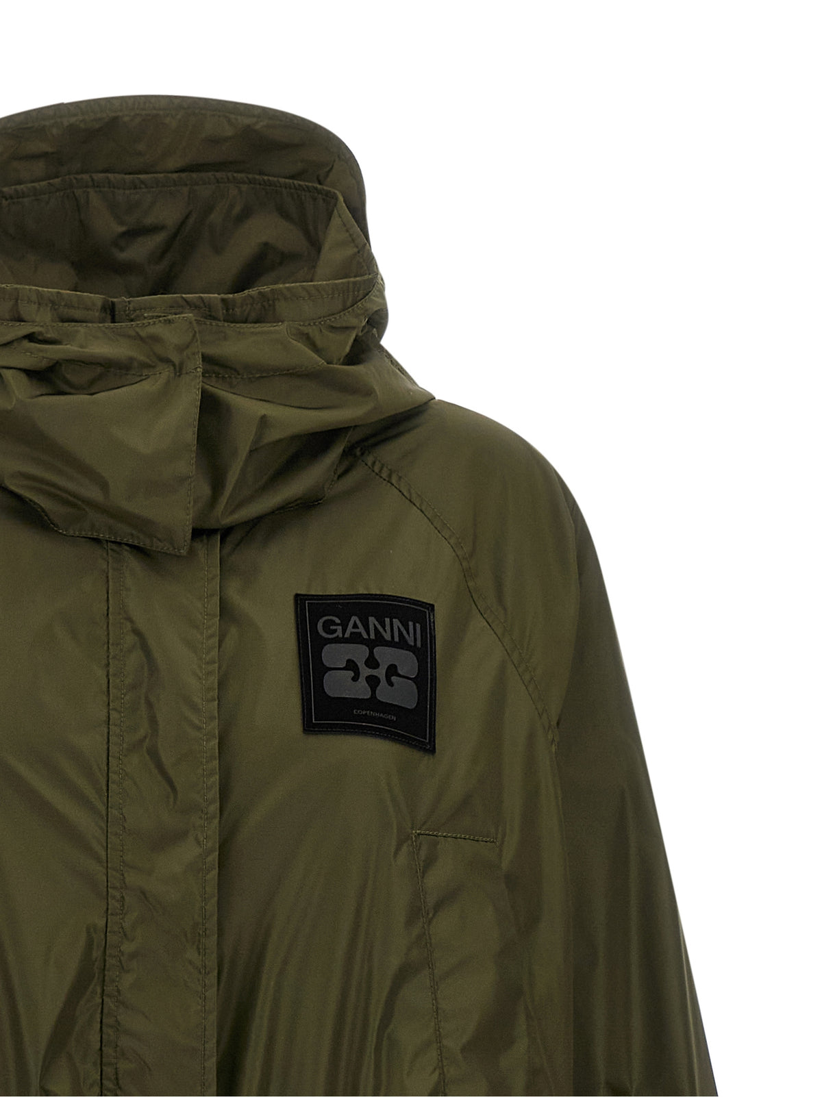 Elevate your wardrobe with the Ganni Bicolor Recycled Polyamide Coat, a sustainable masterpiece in olive green, merging exquisite design with luxurious comfort for the discerning individual.