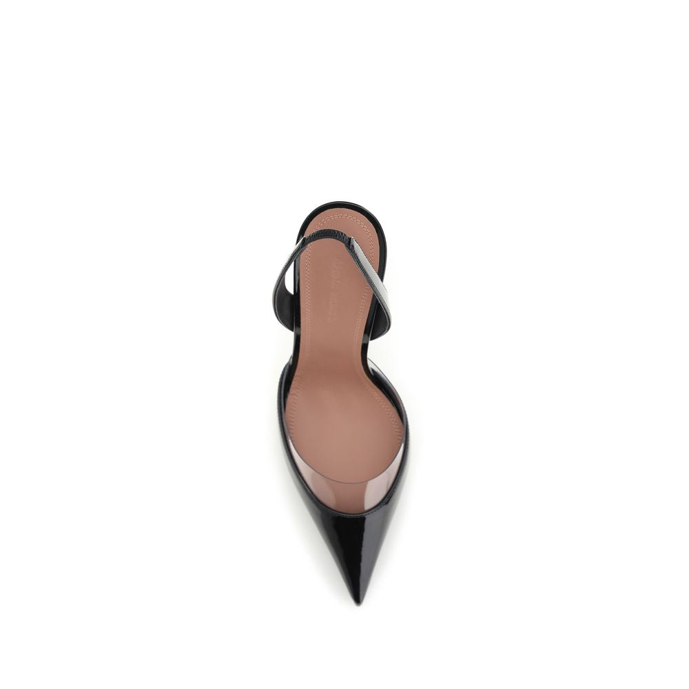 Step into luxury with Amina Muaddi's Black Calf Leather Bos Taurus High Heel Pumps, where Italian craftsmanship meets timeless elegance for the discerning connoisseur.