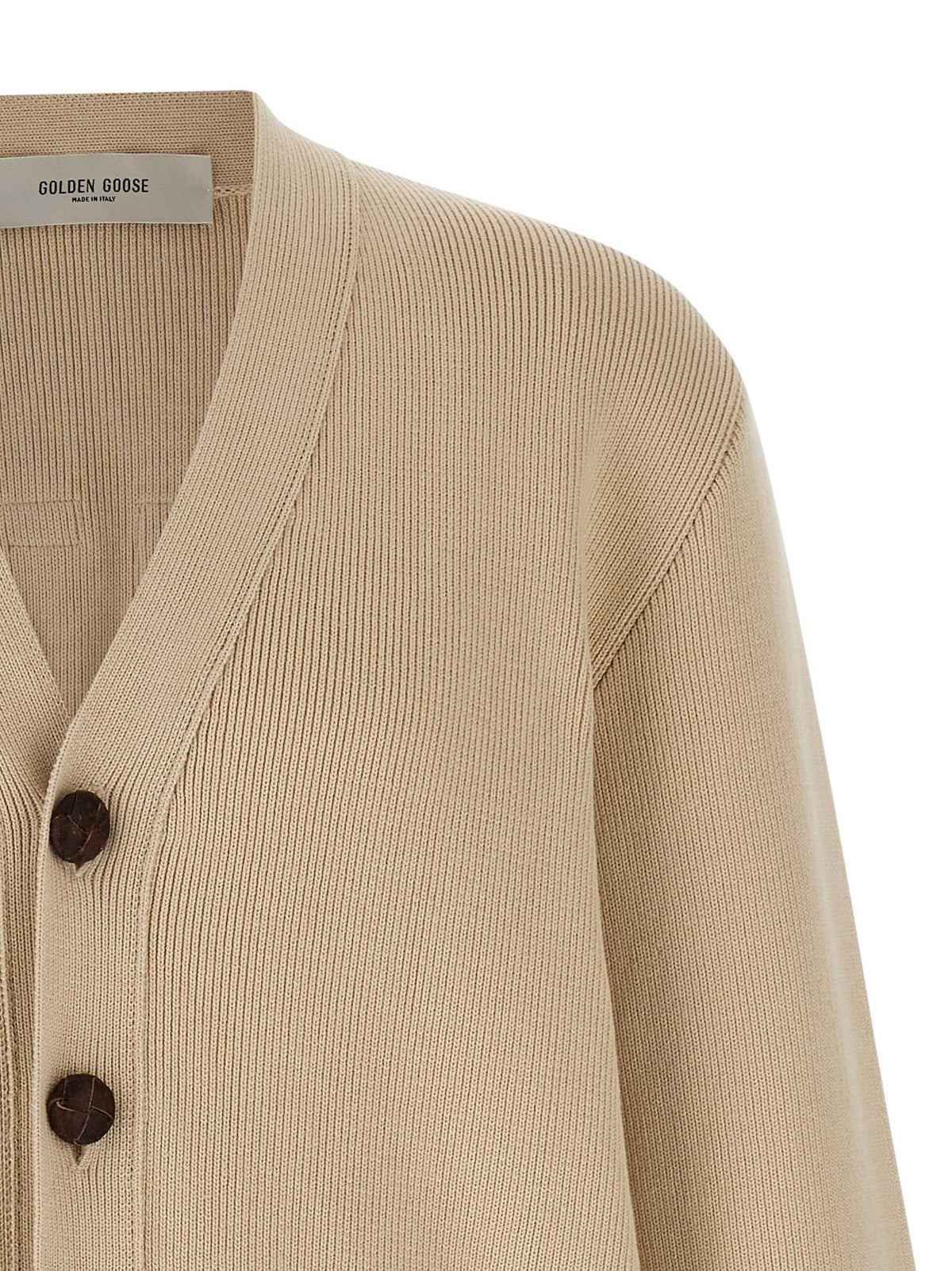 Indulge in the exquisite Golden Goose Beige Cotton Cardigan, a harmonious blend of luxury and comfort, crafted for those who appreciate timeless elegance and sophisticated style.