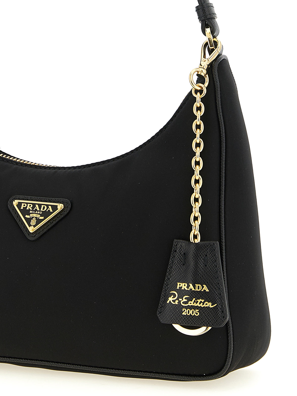 Discover the PRADA Re-Edition 2005 Mini Shoulder Bag, a fusion of iconic design and eco-conscious luxury crafted in Re-Nylon and Saffiano leather for timeless elegance.