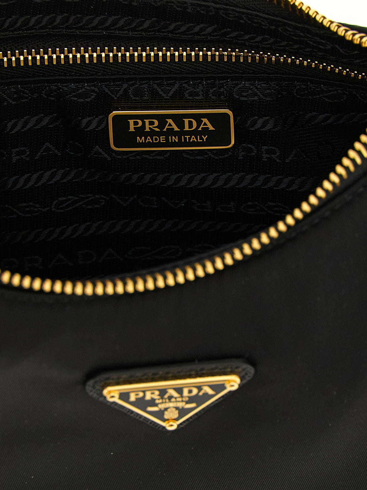 Discover the Prada Re-Edition 2005 Mini Shoulder Bag, a masterpiece of eco-luxury crafted in Re-Nylon and Saffiano leather, embodying timeless elegance and modern sophistication.