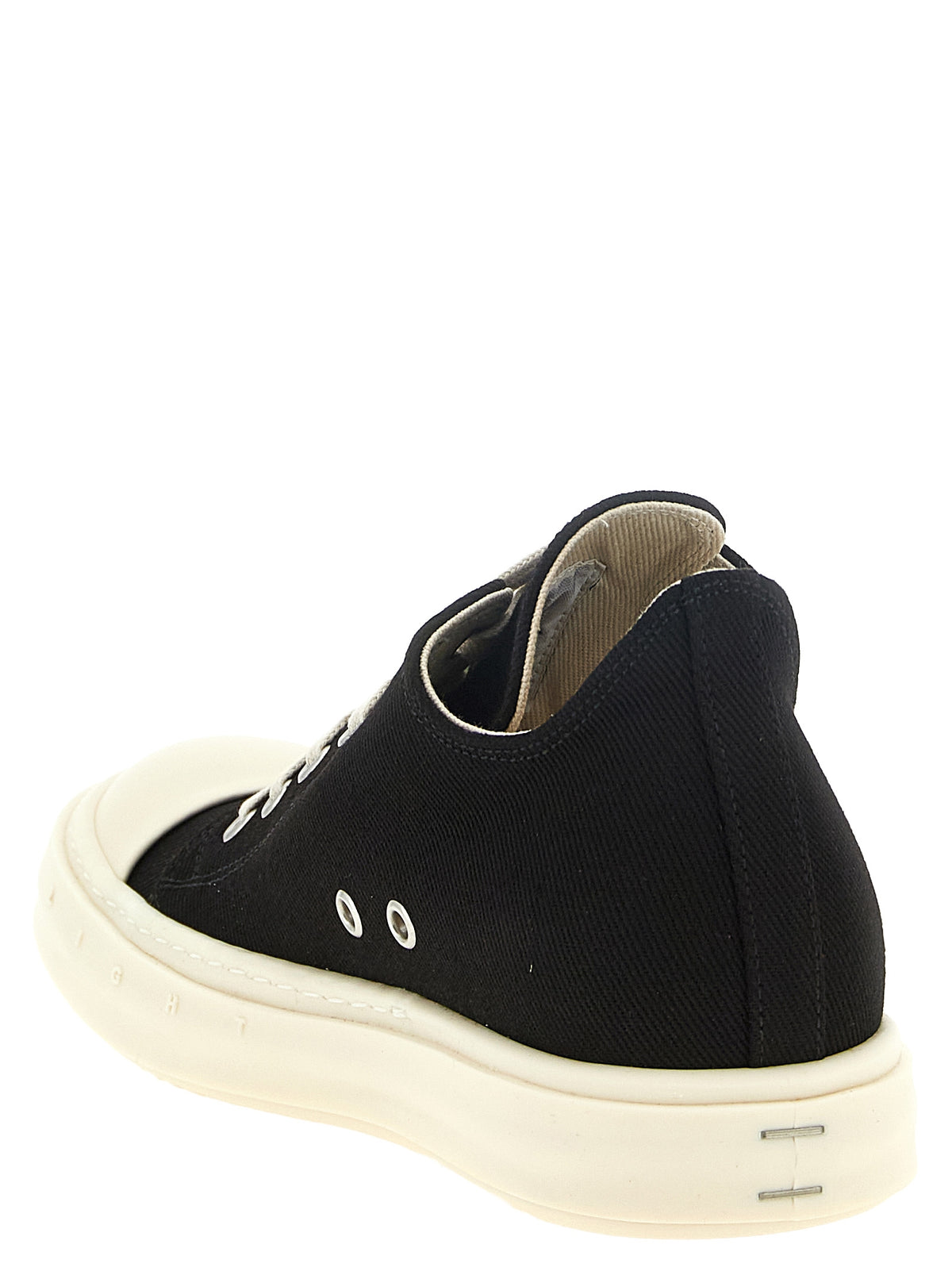 Elevate your style with DRKSHDW Black Cotton Low Top Sneakers, crafted from premium denim canvas, merging bold design with unparalleled comfort for the discerning individual.