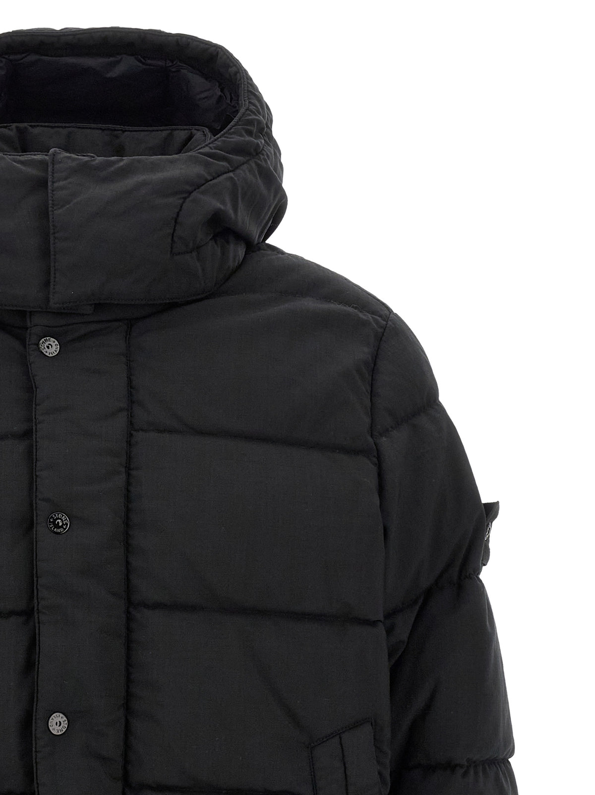 Indulge in the Stone Island Black Virgin Wool Full-Length Jacket, where exquisite craftsmanship meets luxurious comfort, redefining winter elegance for the discerning individual.