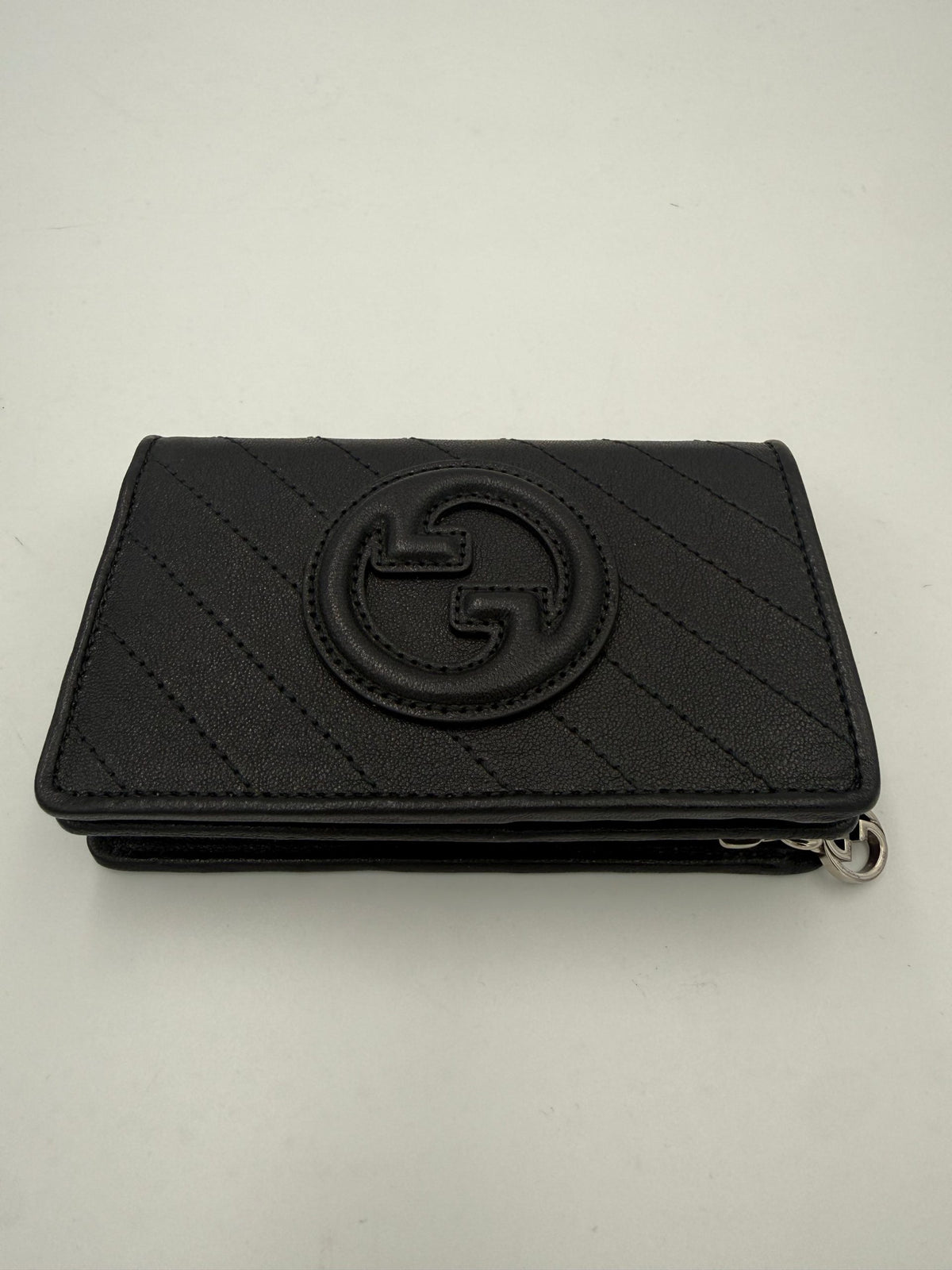 Experience the exquisite allure of the Gucci GG Blondie Wallet, a luxurious blend of brushed calf leather and timeless design, perfect for discerning collectors.