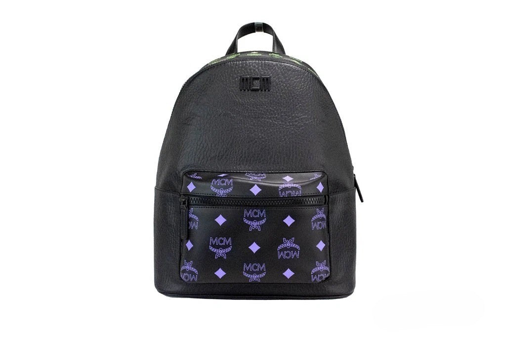 Indulge in the exquisite MCM Color Splash Visetos Medium Backpack, where luxurious mixed leather meets impeccable craftsmanship, elevating your style with every step.