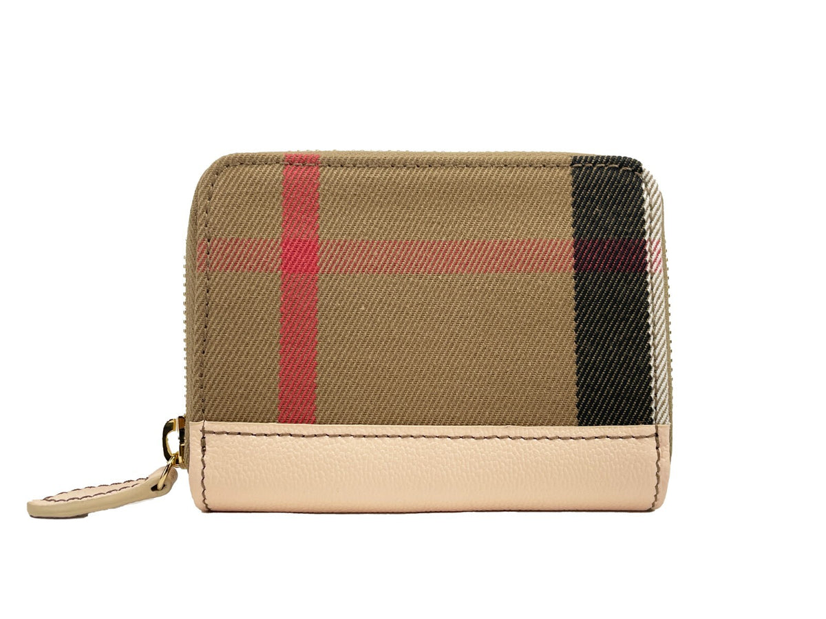 Discover the Burberry MN Zip Around Check Coin Wallet, a blend of exquisite canvas and leather, embodying timeless elegance for the discerning individual.