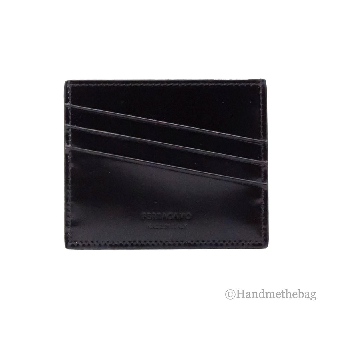 Elevate your style with the Salvatore Ferragamo Slim Black Embossed Patent Leather Card Case Wallet, a testament to exquisite craftsmanship and timeless elegance.