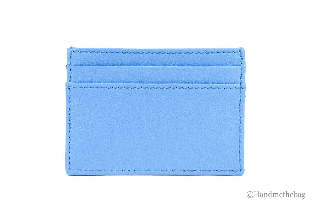 Experience the allure of the Versace Mini Medusa DV Blue Quilted Smooth Nappa Leather Card Case Wallet, where exquisite craftsmanship meets timeless elegance, perfect for discerning individuals.