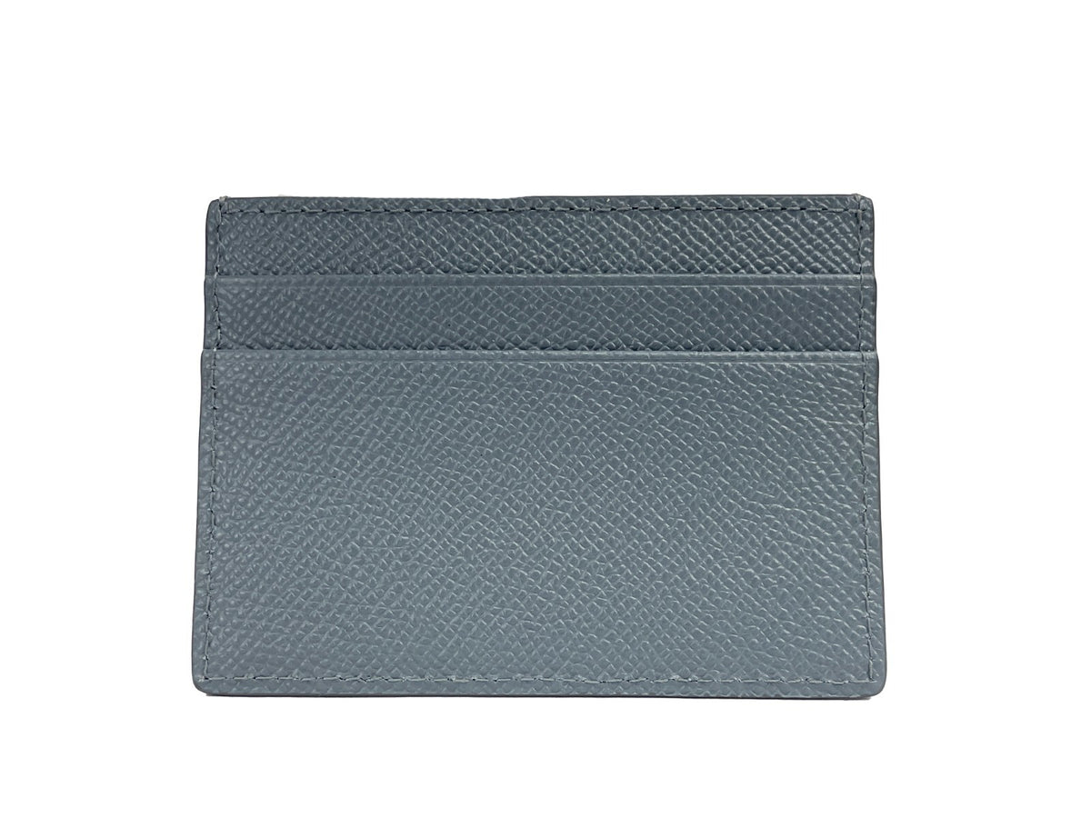 Elevate your elegance with the Burberry Sandon Business Small Grey Grained Leather Card Case Wallet, a timeless blend of sophistication and functionality for the discerning individual.