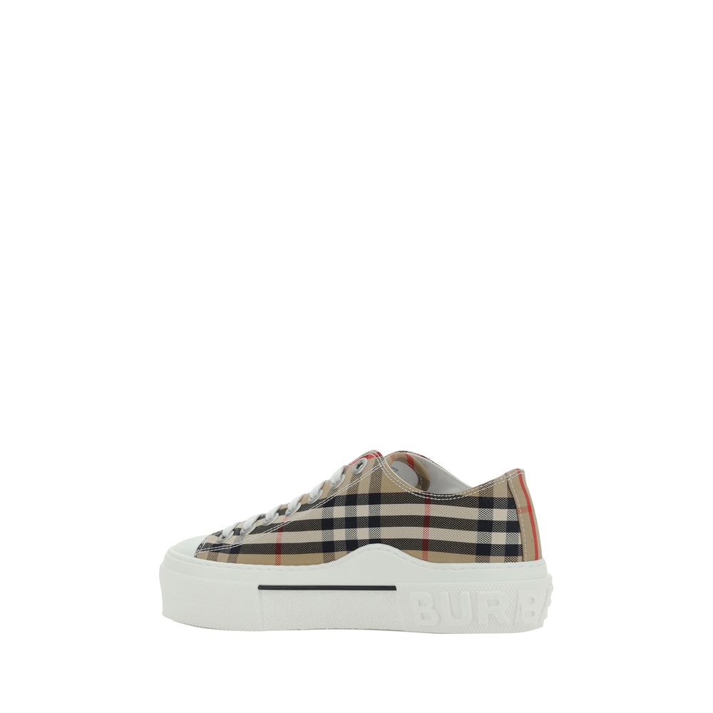 Experience the exquisite Burberry Brown Synthetic Low Top Sneakers, where iconic craftsmanship meets urban elegance, perfect for the discerning individual.