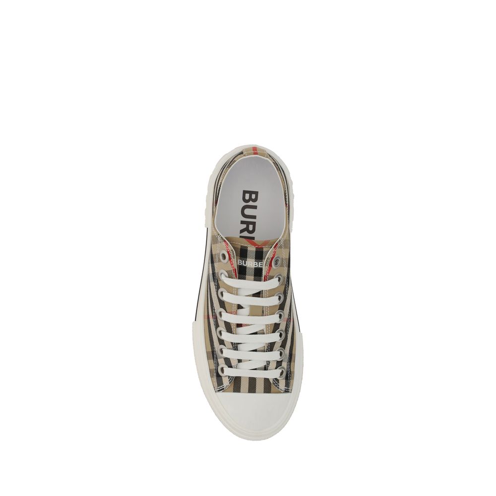 Elevate your style with Burberry Brown Synthetic Low Top Sneakers, where exquisite craftsmanship meets iconic design, perfect for any sophisticated occasion.