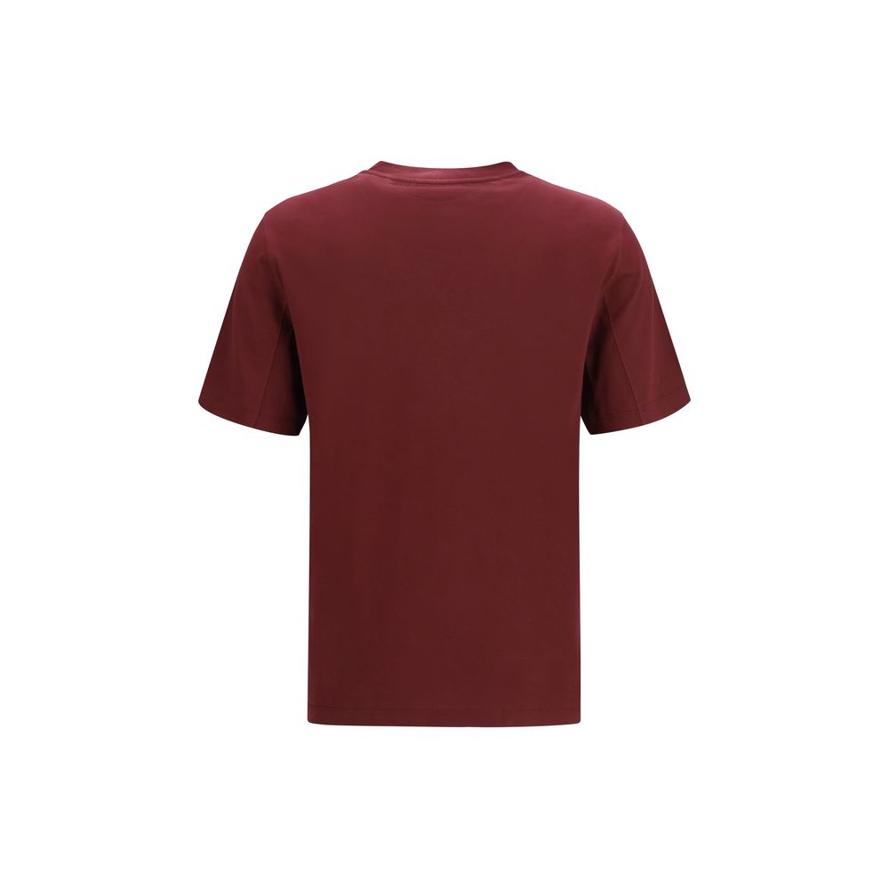 Experience the exquisite Brunello Cucinelli Bordeaux Cotton T-Shirt, a testament to Italian craftsmanship, where luxurious comfort meets timeless elegance for the discerning individual.