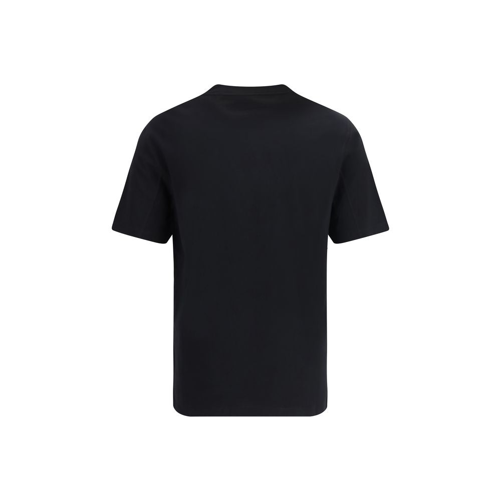 Experience the refined elegance of the Brunello Cucinelli Black Cotton T-Shirt, crafted from luxurious 100% cotton for timeless sophistication in every moment.